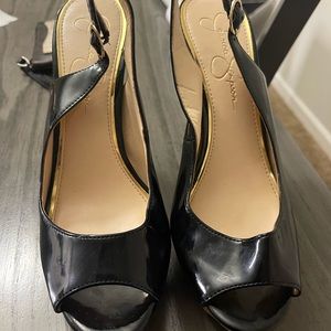 Jessica Simpson heels. Black with a wood style hill.
